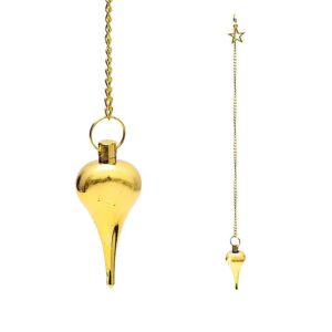 Stjärnpendulum i guldfärg i sammetspåse